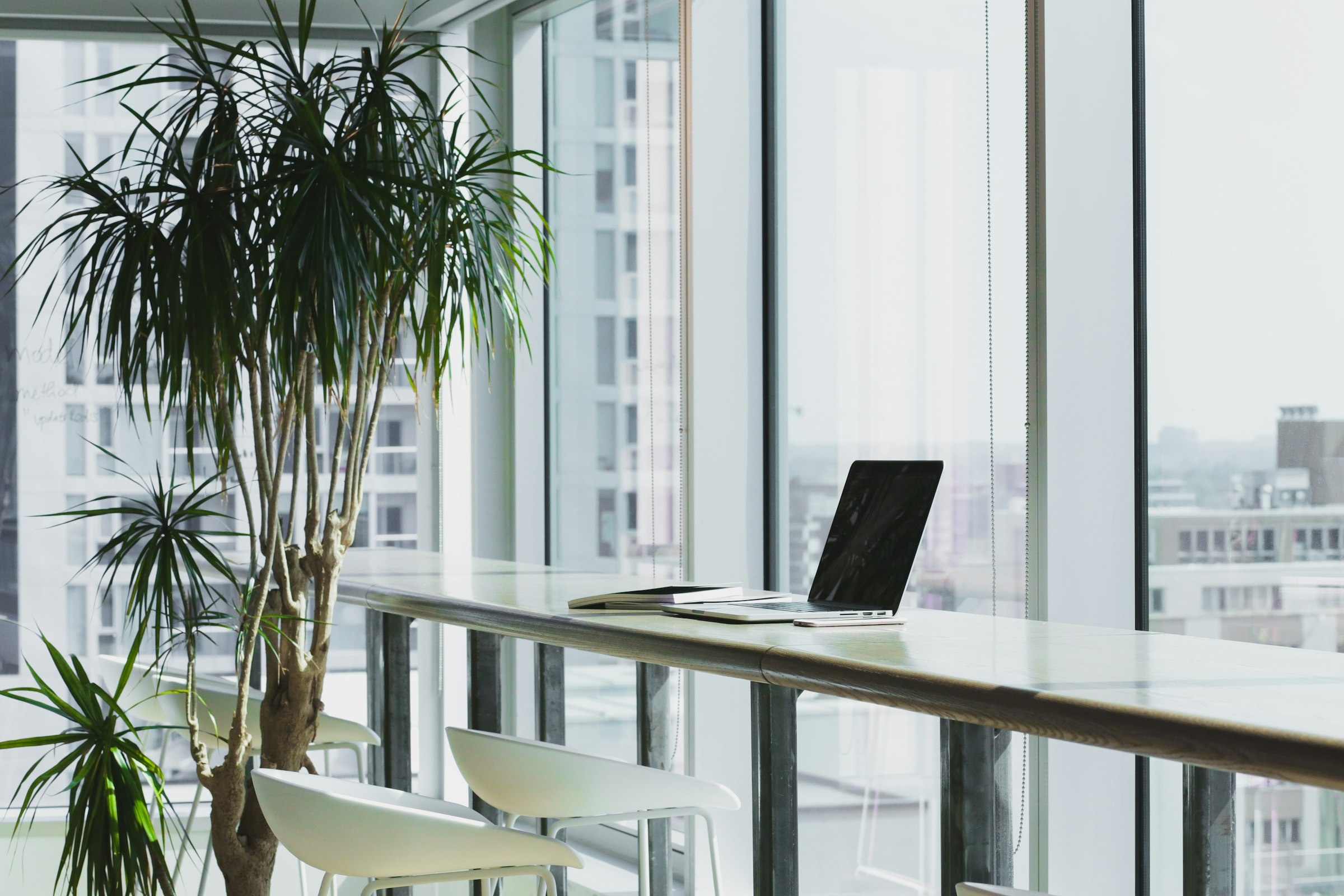A modern workspace with monitors and collaboration tools